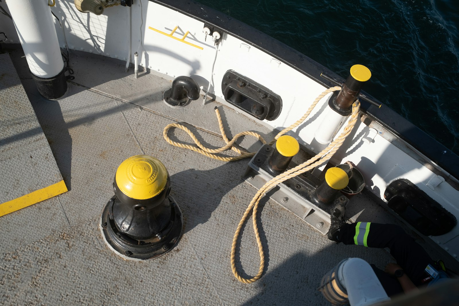 Mooring ropes and bollards on a ship's deck